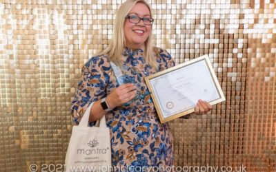 AWARD FOR LOCAL BUSINESS WOMAN HELPING OTHER WOMEN.